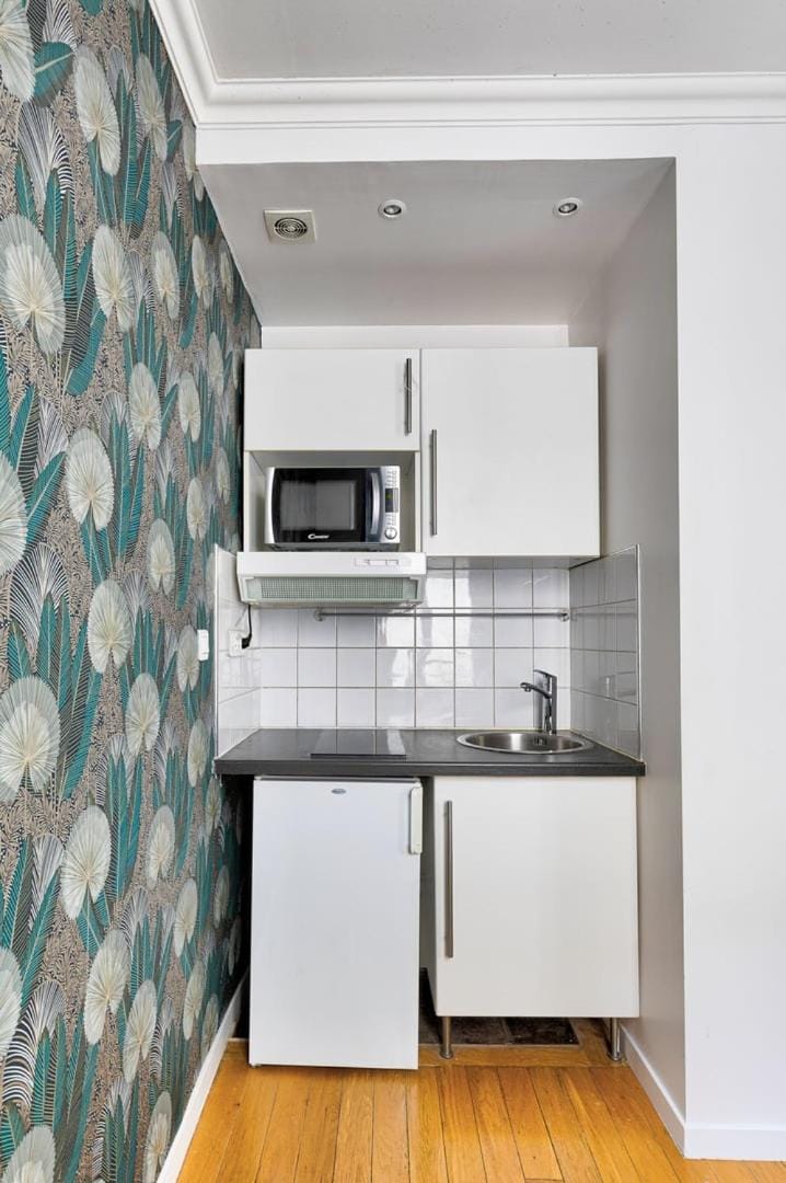 Kitchen or kitchenette, microwave