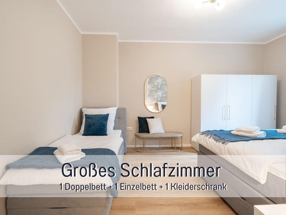 Bed, Photo of the whole room, Bedroom, Text overlay, flat iron, towels, wardrobe