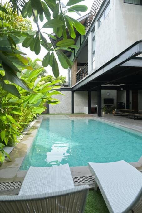 Property building, Patio, Day, Garden, Pool view, Swimming pool