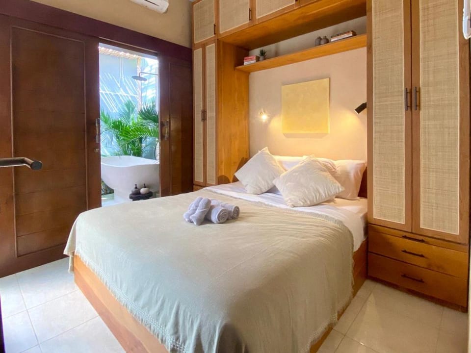 Bed, Bedroom, towels, wardrobe, air conditioner