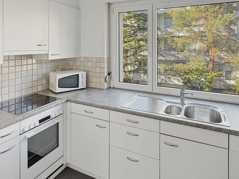 Kitchen or kitchenette, microwave, stove, kitchen