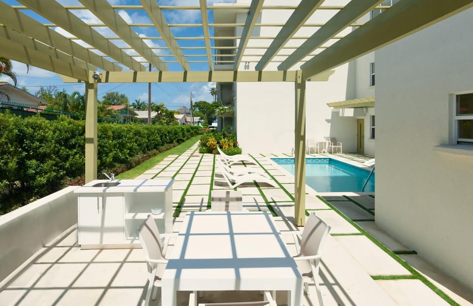 Patio, Garden, Seating area, Dining area, Swimming pool, sunbed