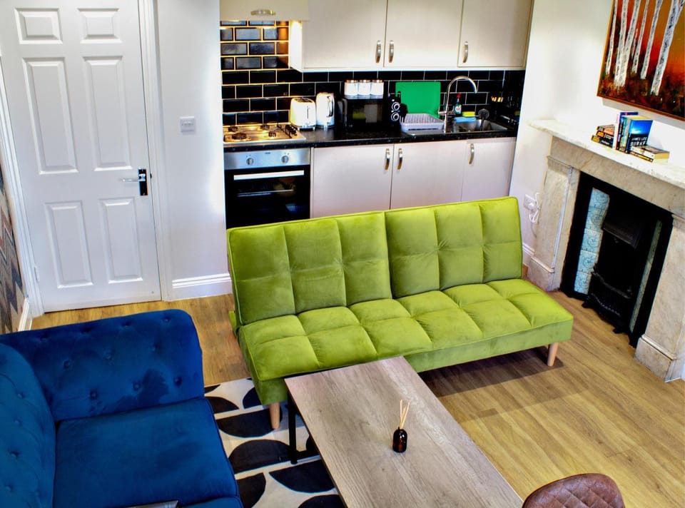 Kitchen or kitchenette, Living room, Seating area, oven, stove, toaster