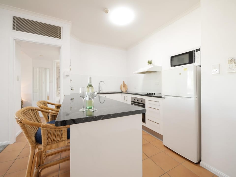 Kitchen or kitchenette, oven