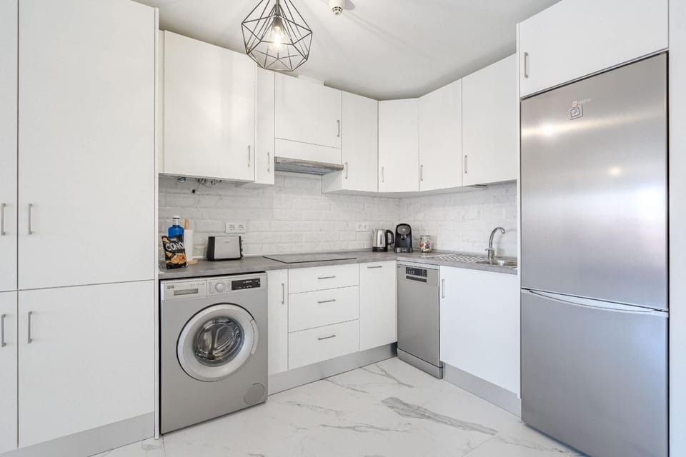 Coffee/tea facilities, Kitchen or kitchenette, dishwasher, microwave, oven, stove, toaster, washing machine