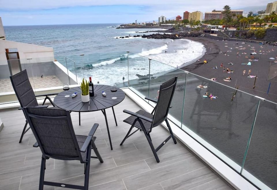 Natural landscape, View (from property/room), Seating area, Dining area, Beach, Sea view