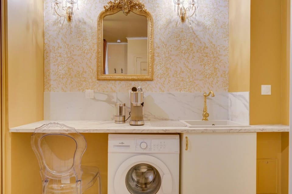 Kitchen or kitchenette, stove, washing machine