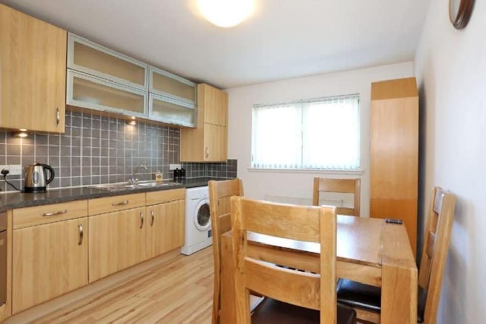 Kitchen or kitchenette, Dining area, dishwasher, oven, pet friendly, stove, toaster, washing machine, dryer