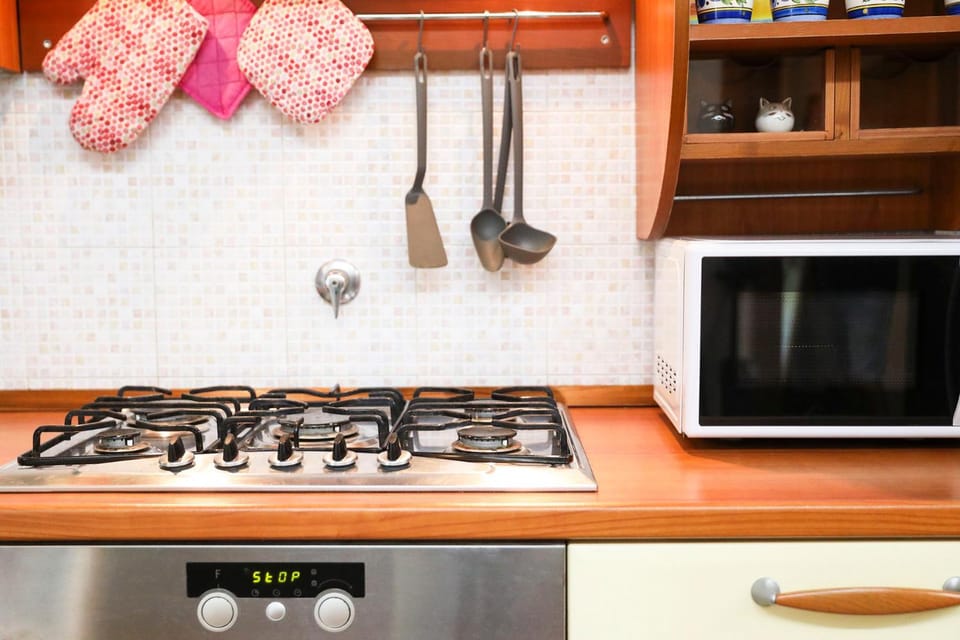 Kitchen or kitchenette, stove