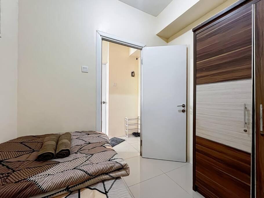 2BR Apt Green Pramuka with Pool & Wi-Fi by 2ndHome Apartment in Jakarta