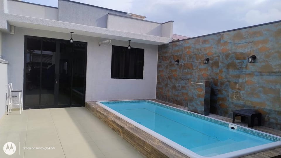 Casa a 300 metros do mar com Piscina House in Guaratuba