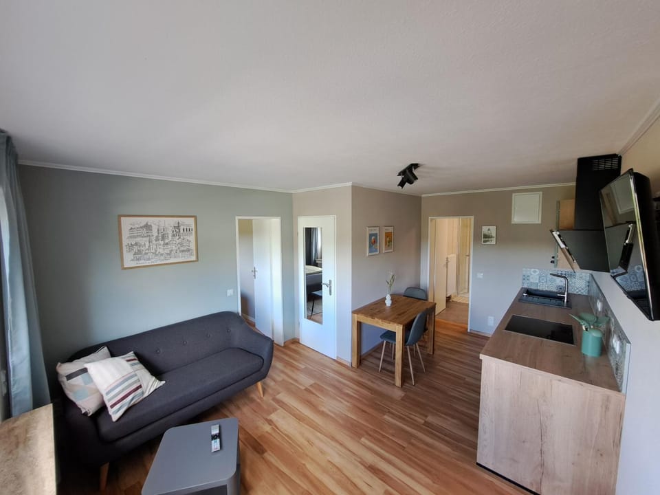 Kitchen or kitchenette, Living room, Seating area, Dining area