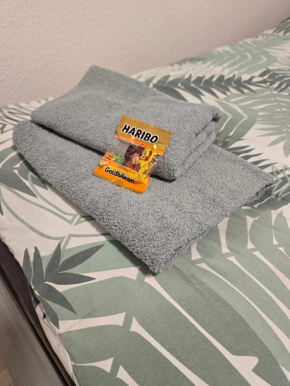 Bed, Property logo or sign, Logo/Certificate/Sign, Bedroom, Certificate/Award, towels