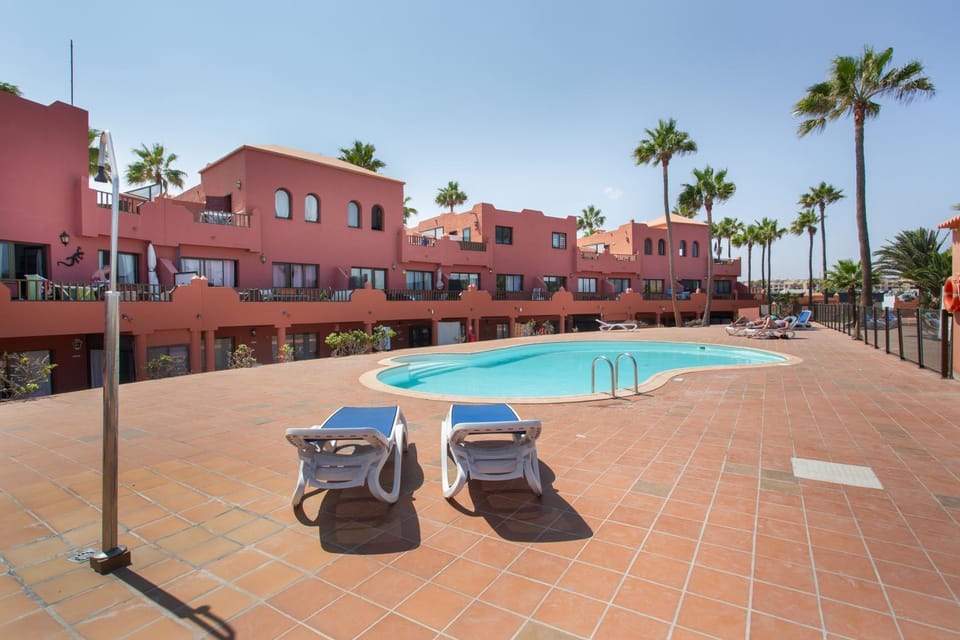 Property building, Living room, Swimming pool