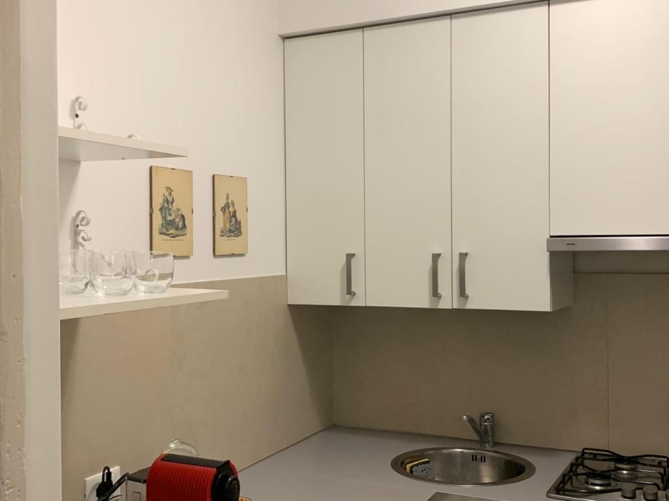 Kitchen or kitchenette, stove