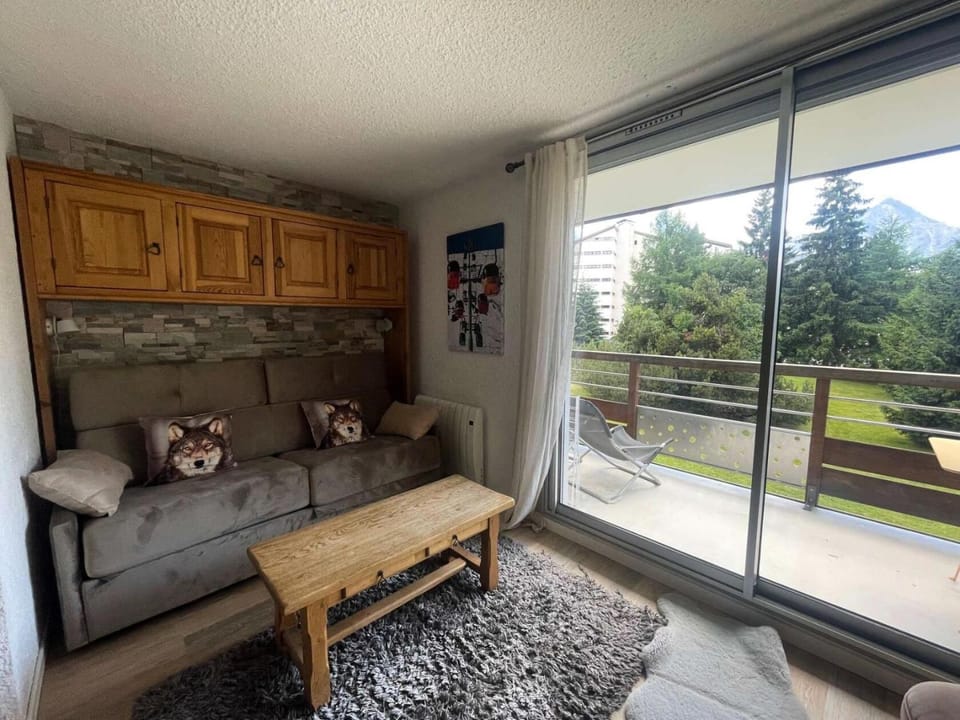 Bed, Living room, fireplace, kitchen