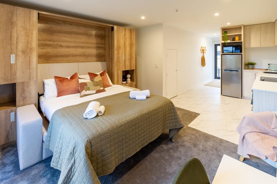 Bed, Kitchen or kitchenette, Bedroom, oven, towels, wardrobe