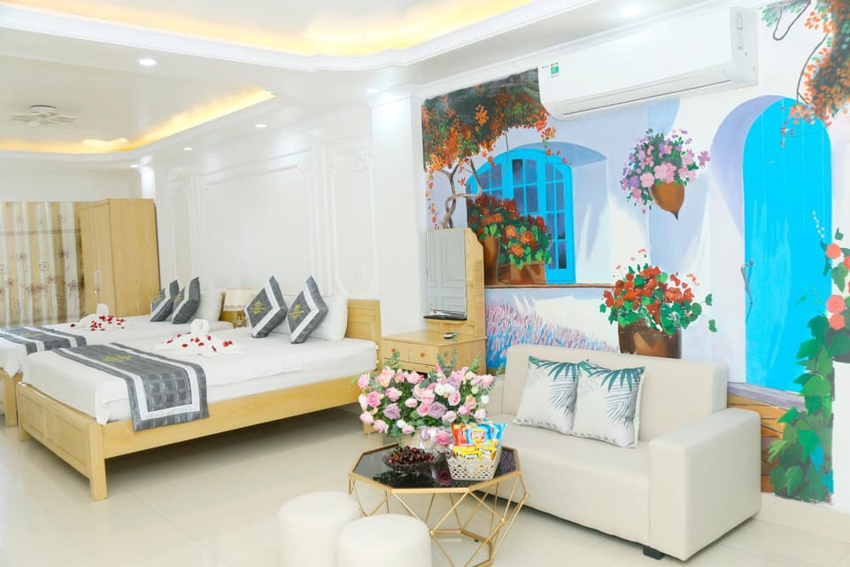 Bed, Living room, Seating area, Bedroom