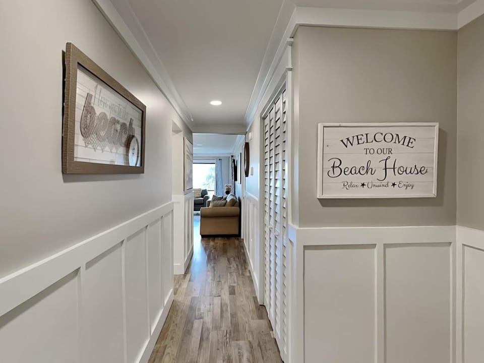 Property logo or sign, Living room, Seating area, furniture