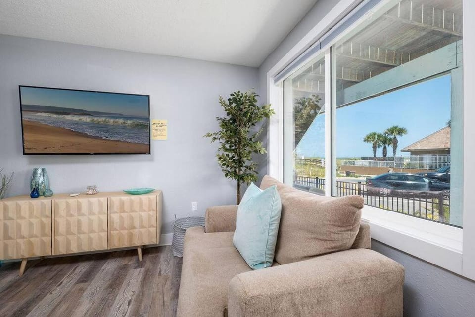 View (from property/room), Living room, Seating area, Sea view