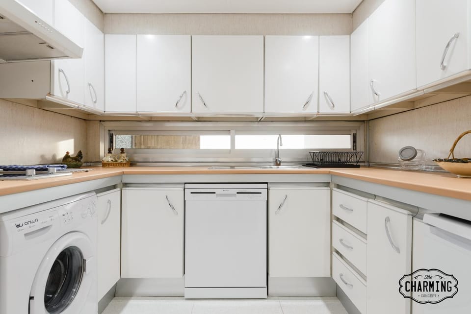 Kitchen or kitchenette, dishwasher, stove, washing machine