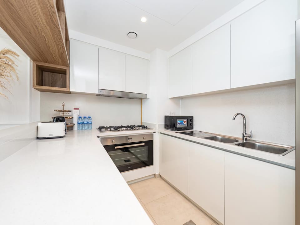 Kitchen or kitchenette, oven, stove, toaster