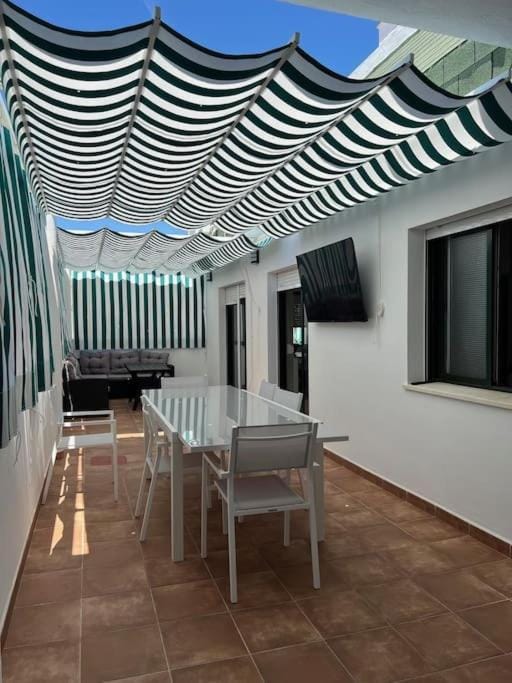 Espectacular Ático con Terraza en Playa Centro de Punta Umbría 140m2 - 10 Personas Apartment in Punta Umbría