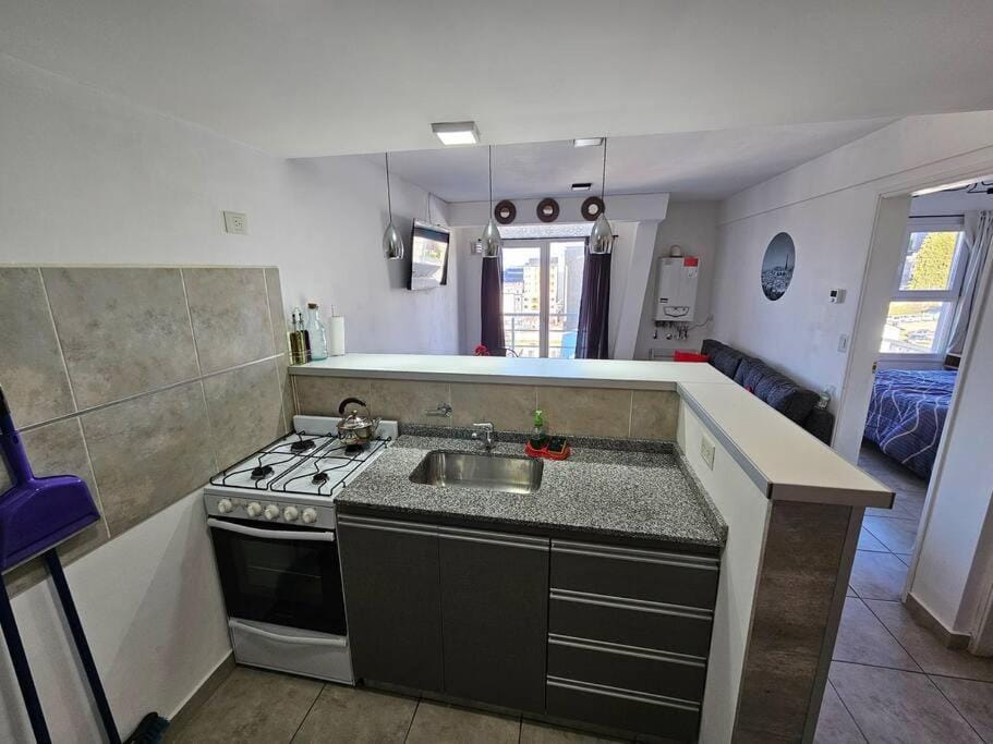 Kitchen or kitchenette, oven, stove
