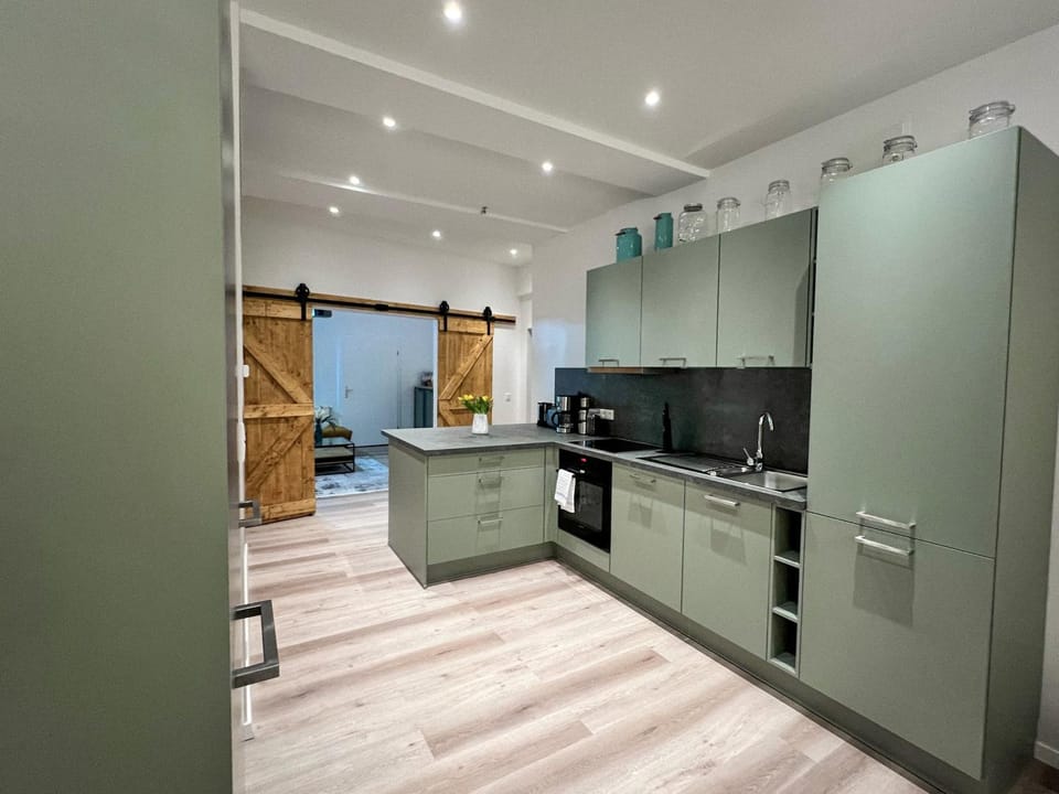 Kitchen or kitchenette, stove, kitchen