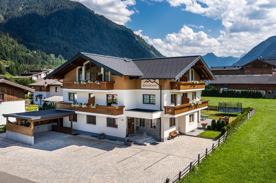 Property building, Facade/entrance, Spring, Natural landscape, Mountain view
