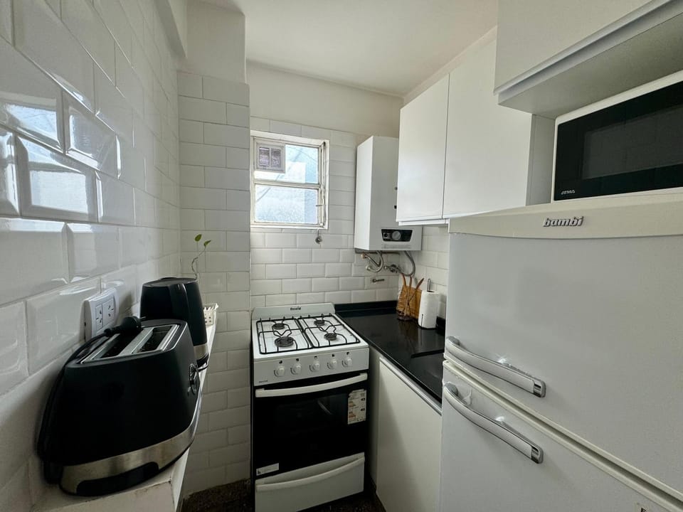 Kitchen or kitchenette, oven, toaster