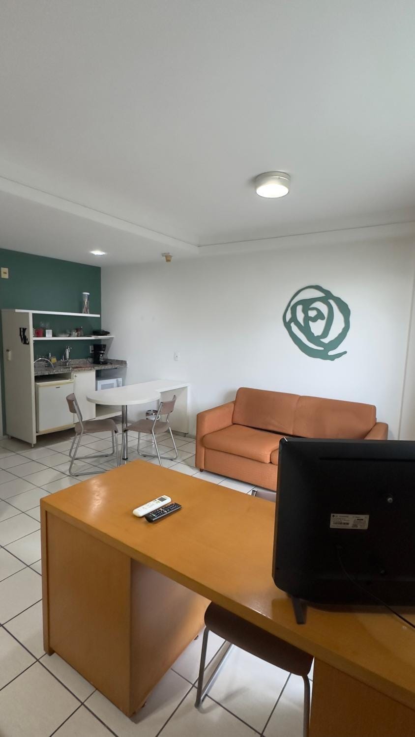 Praia do Canto Apart Hotel - Quarto sala e varanda Apartment in Vitoria