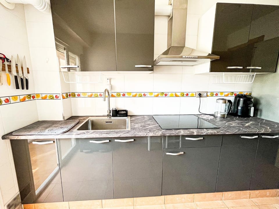 Kitchen or kitchenette, stove