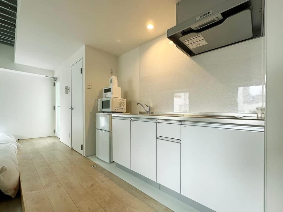 Kitchen or kitchenette, stove