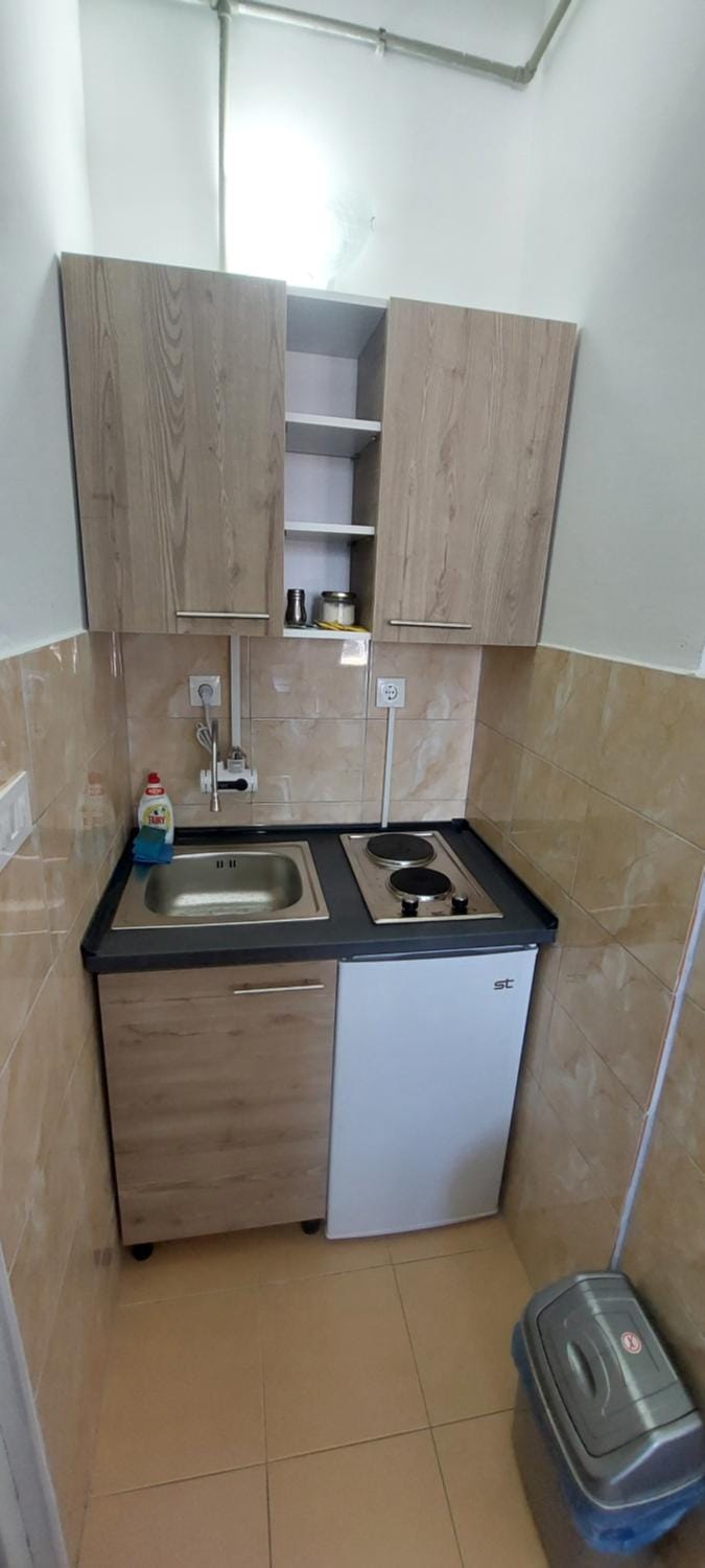 Kitchen or kitchenette, stove