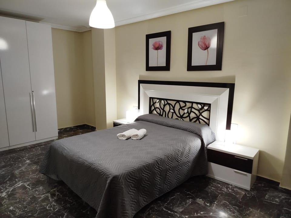 Bed, Photo of the whole room, Bedroom, towels, wardrobe
