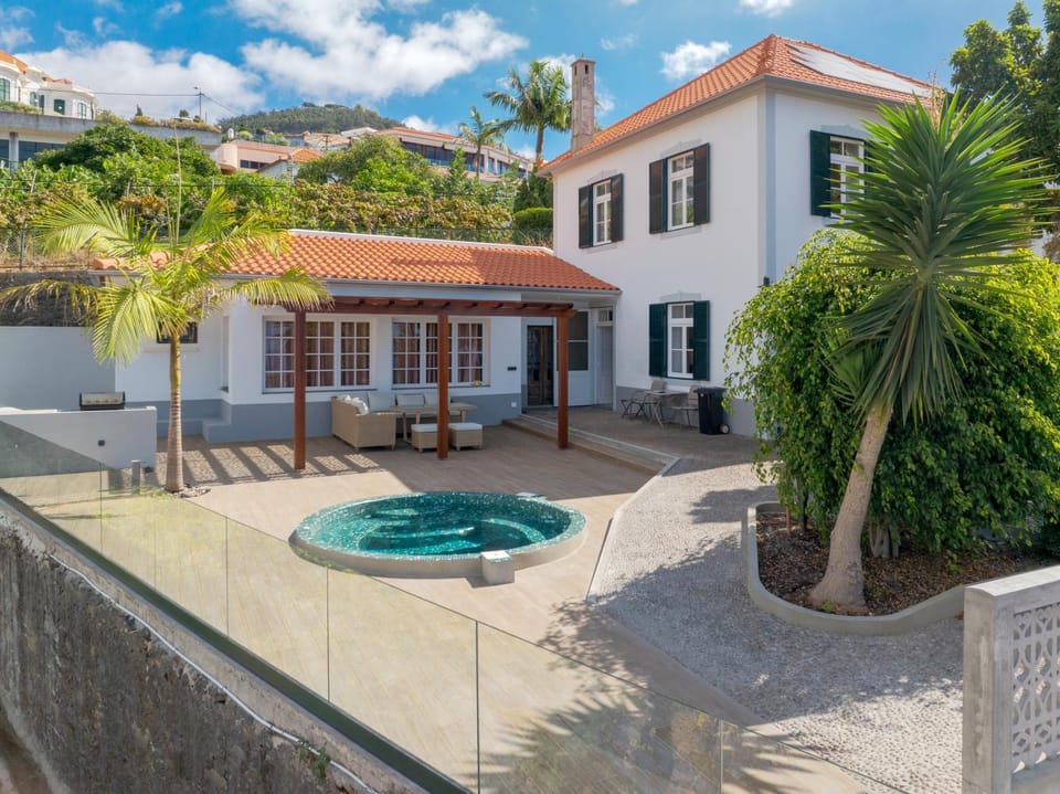 Property building, Patio, Day, Natural landscape, Garden, Swimming pool