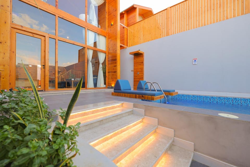 Property building, Patio, Day, Pool view, Swimming pool, sunbed