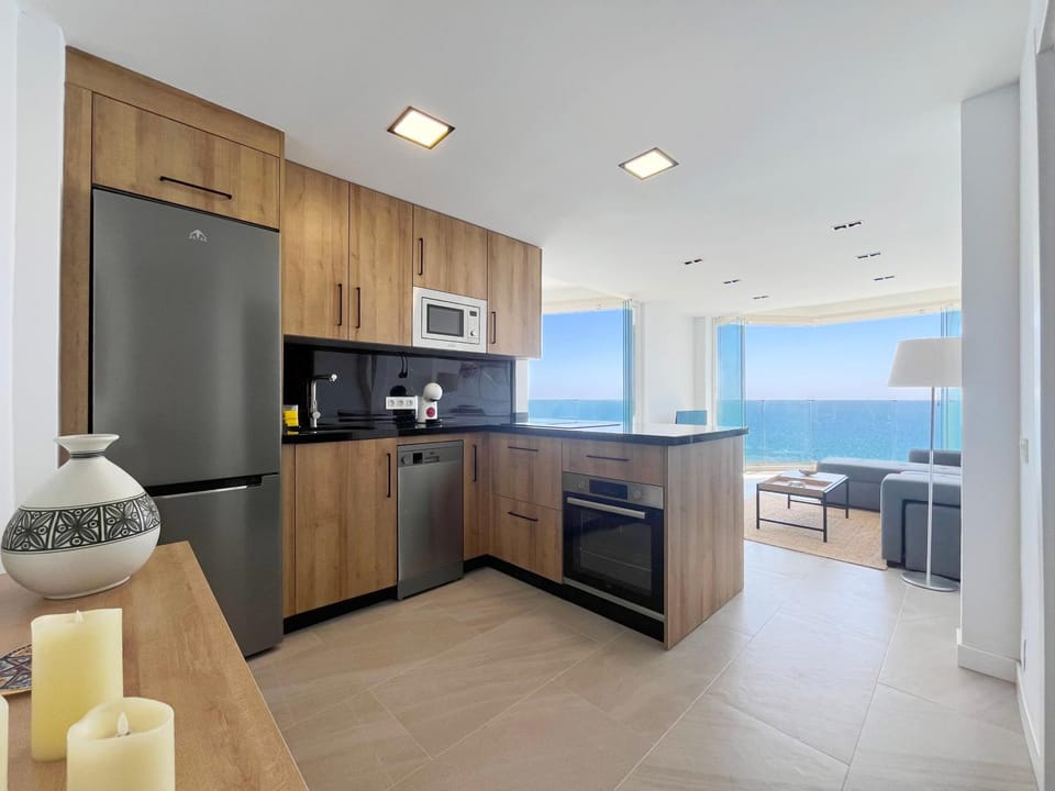 Coffee/tea facilities, Kitchen or kitchenette, Sea view, dishwasher, flat iron, microwave, oven, stove, toaster, washing machine, dryer