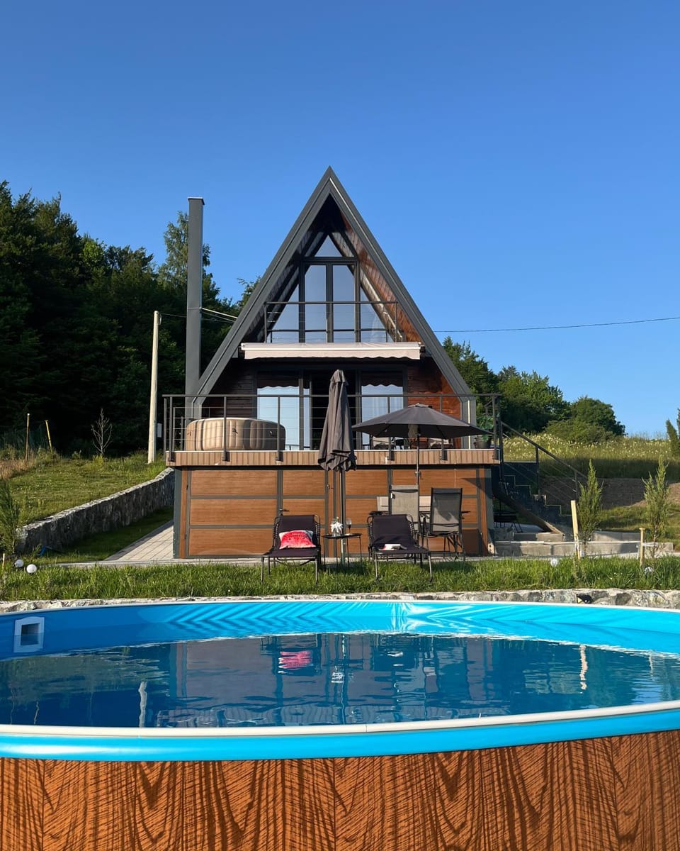 Property building, View (from property/room), Pool view, Swimming pool, sunbed