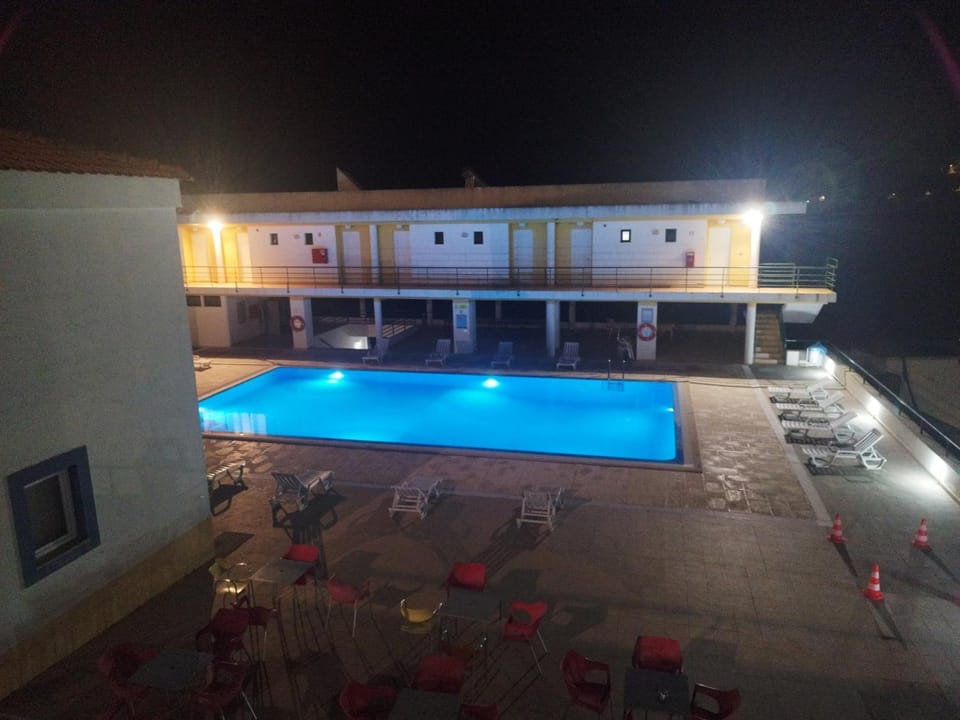 Property building, Night, Pool view, Swimming pool
