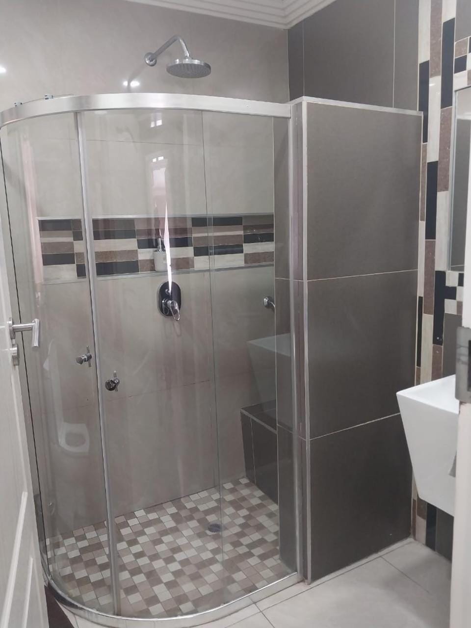 Shower, Toilet, Bathroom, hair dryier, towels