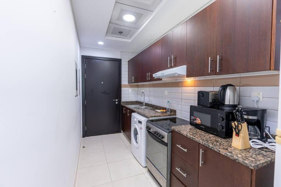 Kitchen or kitchenette, oven, stove, toaster