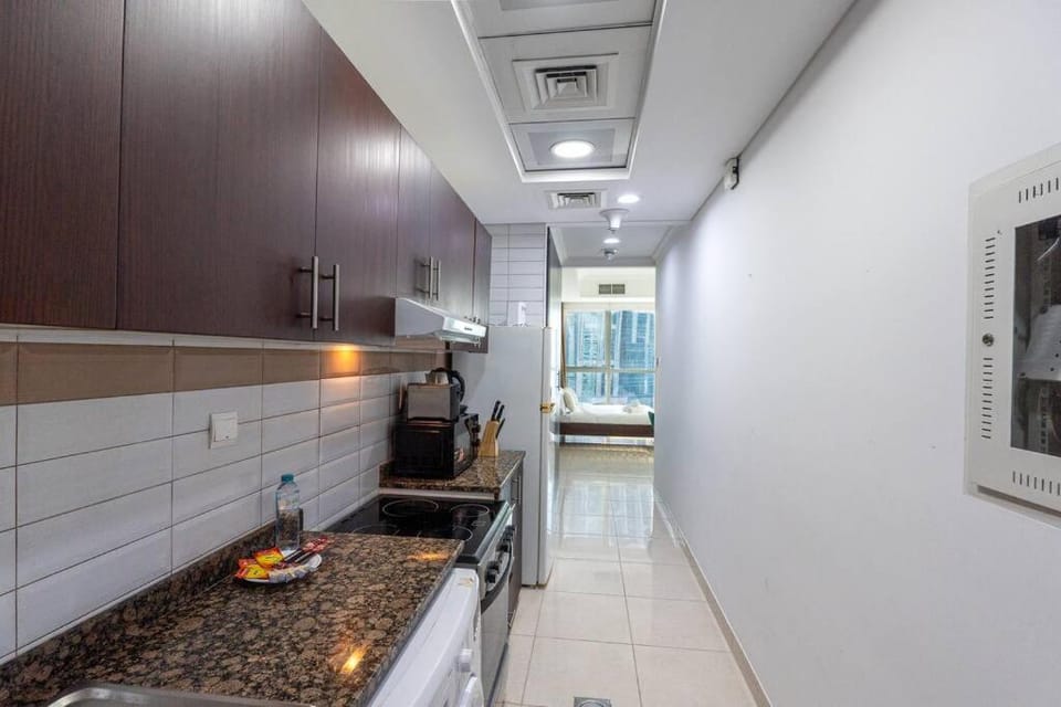 Kitchen or kitchenette, oven, stove