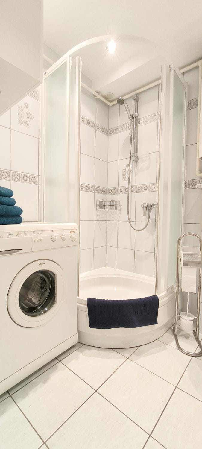 Shower, Bathroom, towels, washing machine, dryer