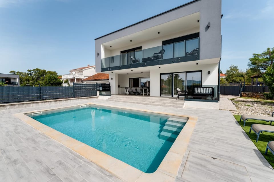 Beautiful new villa with a pool near beach - by TRAVELER tourist agency Krk ID 2410 Villa in Primorje-Gorski Kotar County