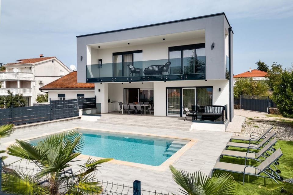 Beautiful new villa with a pool near beach - by TRAVELER tourist agency Krk ID 2410 Villa in Primorje-Gorski Kotar County