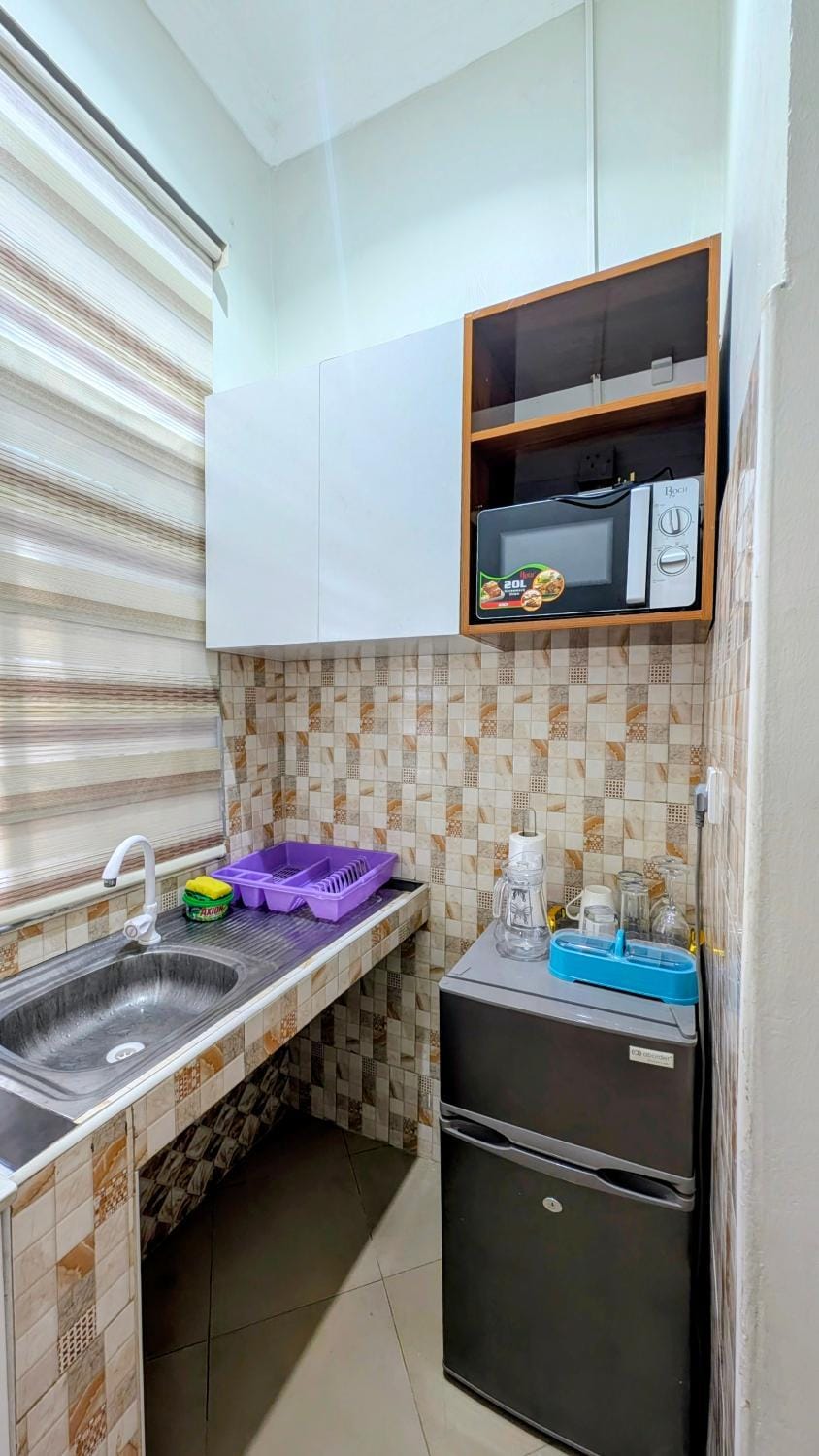Kitchen or kitchenette, microwave