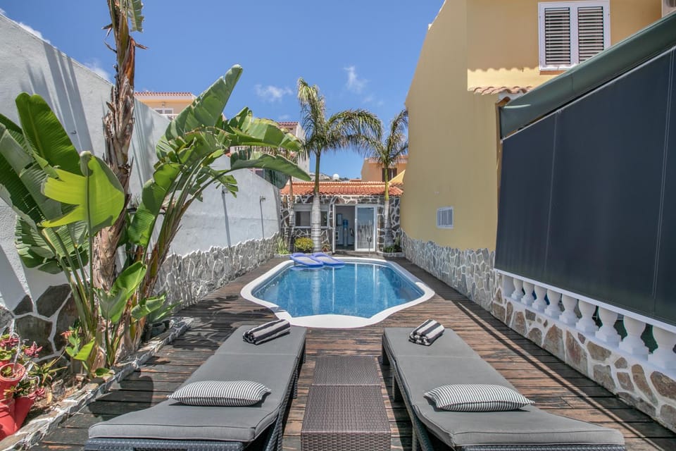 Property building, Living room, Swimming pool