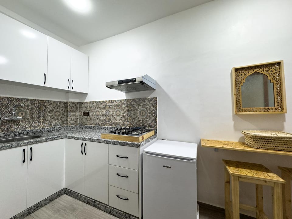 Kitchen or kitchenette, stove